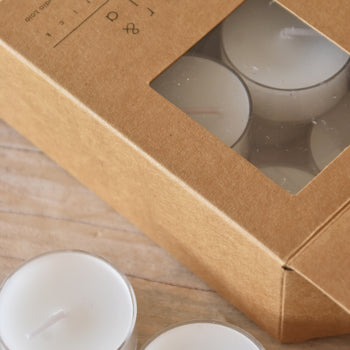 סט של 12 נרות טילייט לבנים קטנים