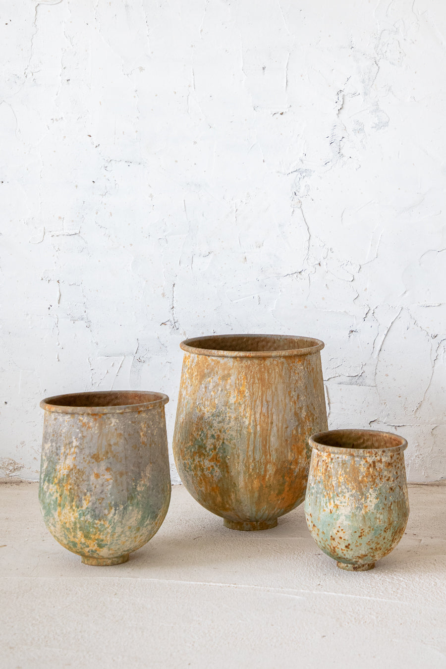 כד פח חלודה בארבע מידות